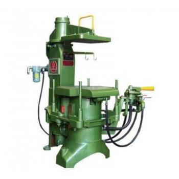 JOLT SQUEEZE STRIPPER MOULDING MACHINE